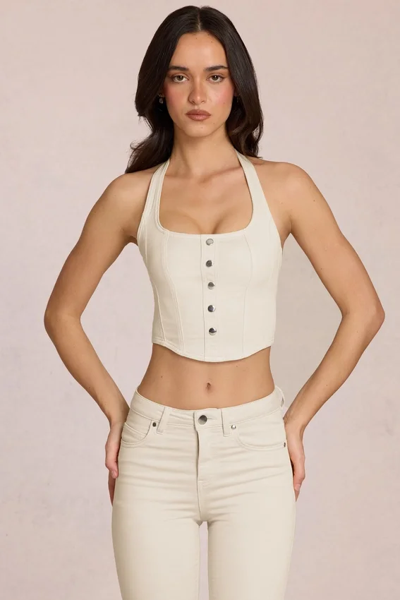 Elowis denimtop i korsettstil med halterneck i färgen Ivory Elowis denimtop i korsettstil med halterneck i färgen Ivory