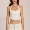 Elowis denimtop i korsettstil med halterneck i färgen Ivory Elowis denimtop i korsettstil med halterneck i färgen Ivory