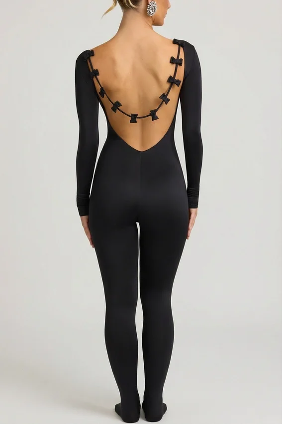 Eulalie Slinky Jersey Jumpsuit med rosettdetalj i svart Eulalie Slinky Jersey Jumpsuit med rosettdetalj i svart