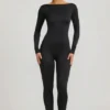 Eulalie Slinky Jersey Jumpsuit med rosettdetalj i svart Eulalie Slinky Jersey Jumpsuit med rosettdetalj i svart