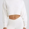 Fladdrande byxor i texturerad bomullsjersey i vitt Fladdrande byxor i texturerad bomullsjersey i vitt