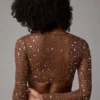 Guilia genomskinlig, dekorerad kort topp med långa ärmar i färgen Mocha Guilia genomskinlig, dekorerad kort topp med långa ärmar i färgen Mocha