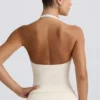 Halterneck-linne med öppen rygg i ivory marl Halterneck-linne med öppen rygg i ivory marl
