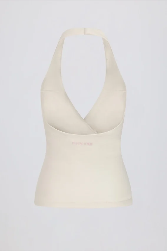 Halterneck-linne med öppen rygg i ivory marl Halterneck-linne med öppen rygg i ivory marl