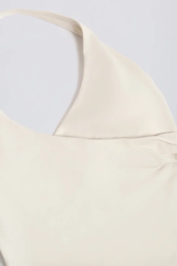 Halterneck-linne med öppen rygg i ivory marl Halterneck-linne med öppen rygg i ivory marl