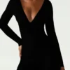 Helene Modal Ruched Plunge Flared Jumpsuit i svart Helene Modal Ruched Plunge Flared Jumpsuit i svart