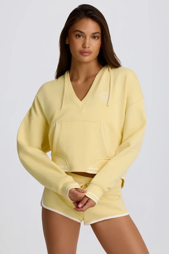 Hoodie i bomullsjersey med V-ringning i färgen Lemon Hoodie i bomullsjersey med V-ringning i färgen Lemon