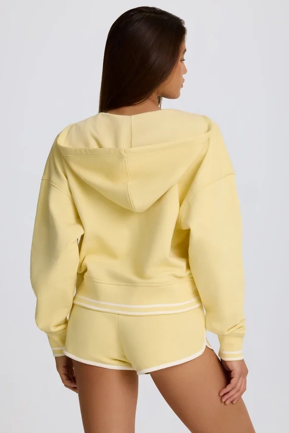 Hoodie i bomullsjersey med V-ringning i färgen Lemon Hoodie i bomullsjersey med V-ringning i färgen Lemon