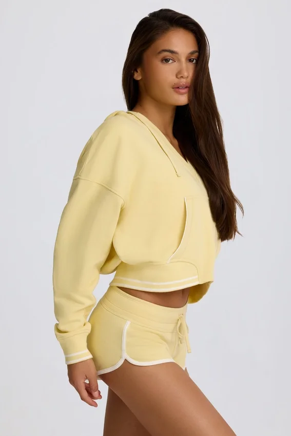 Hoodie i bomullsjersey med V-ringning i färgen Lemon Hoodie i bomullsjersey med V-ringning i färgen Lemon