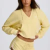 Hoodie i bomullsjersey med V-ringning i färgen Lemon Hoodie i bomullsjersey med V-ringning i färgen Lemon