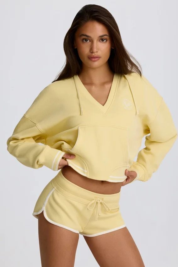 Hoodie i bomullsjersey med V-ringning i färgen Lemon Hoodie i bomullsjersey med V-ringning i färgen Lemon