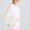 Hoodie i strukturerad bomullsjersey med grafiskt tryck i vitt Hoodie i strukturerad bomullsjersey med grafiskt tryck i vitt
