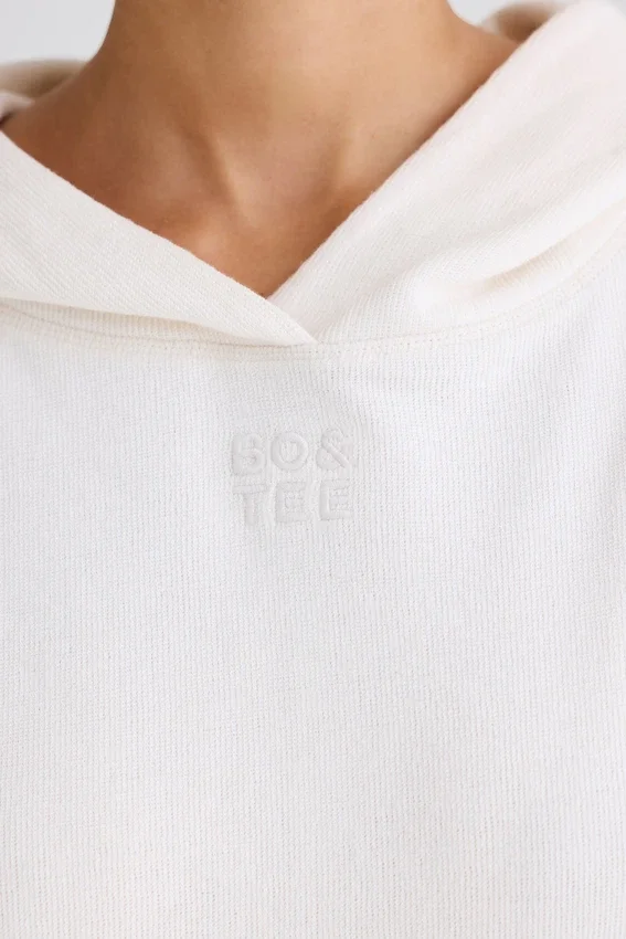 Hoodie i strukturerad bomullsjersey med grafiskt tryck i vitt Hoodie i strukturerad bomullsjersey med grafiskt tryck i vitt