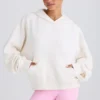 Hoodie i strukturerad bomullsjersey med grafiskt tryck i vitt Hoodie i strukturerad bomullsjersey med grafiskt tryck i vitt