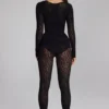 Irina långärmad sömlös stickad Jumpsuit i svart Irina långärmad sömlös stickad Jumpsuit i svart