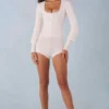 Ismera stickad långärmad jumpsuit i ivory Ismera stickad långärmad jumpsuit i ivory