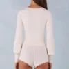 Ismera stickad långärmad jumpsuit i ivory Ismera stickad långärmad jumpsuit i ivory