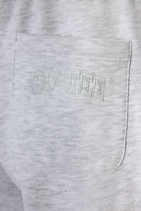 Joggingbyxor i borstad jersey med vida ben i gråmelerat Joggingbyxor i borstad jersey med vida ben i gråmelerat