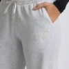 Joggingbyxor med låg midja och vida ben i gråmelerat Joggingbyxor med låg midja och vida ben i gråmelerat