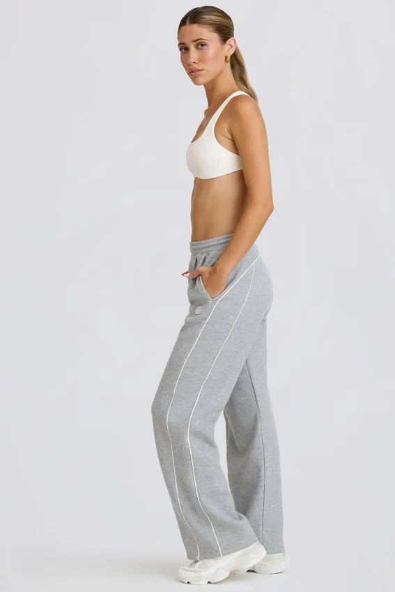 Joggingbyxor med medelhög midja och raka ben i gråmelerat Joggingbyxor med medelhög midja och raka ben i gråmelerat