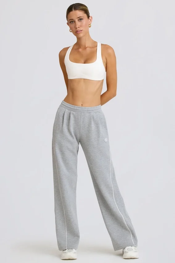 Joggingbyxor med medelhög midja och raka ben i gråmelerat Joggingbyxor med medelhög midja och raka ben i gråmelerat