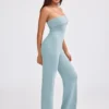 Jumpsuit i grovstickad bandeau med utsvängda ben i dammig blågrön Jumpsuit i grovstickad bandeau med utsvängda ben i dammig blågrön
