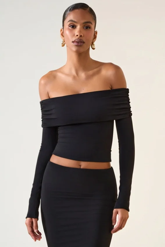 Kesia Modal Off-Shoulder Long-Sleeve Top i svart Kesia Modal Off-Shoulder Long-Sleeve Top i svart