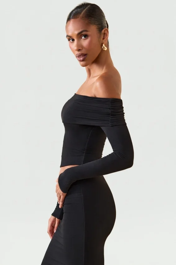 Kesia Modal Off-Shoulder Long-Sleeve Top i svart Kesia Modal Off-Shoulder Long-Sleeve Top i svart
