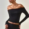 Kesia Modal Off-Shoulder Long-Sleeve Top i svart Kesia Modal Off-Shoulder Long-Sleeve Top i svart