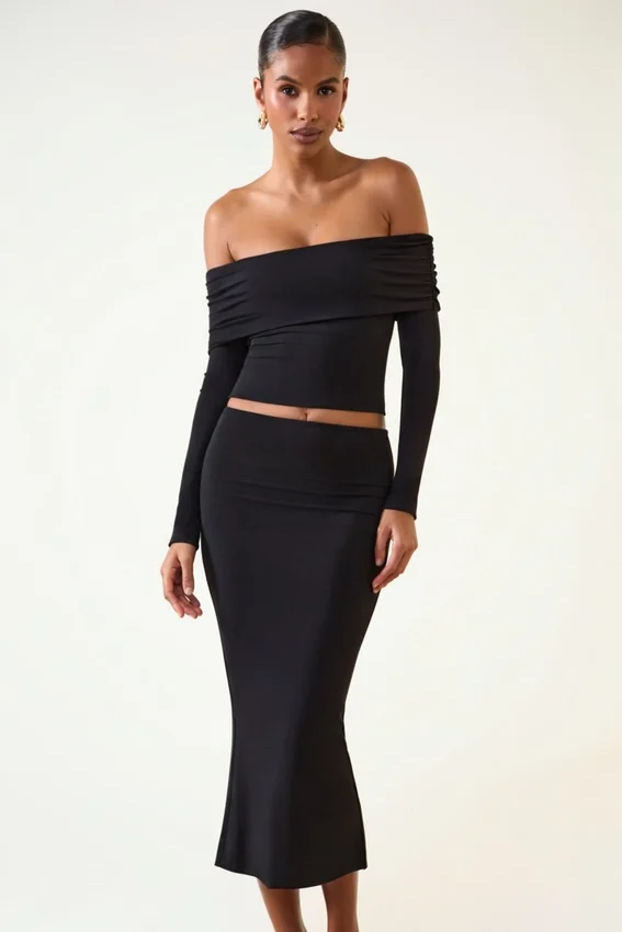 Kesia Modal Off-Shoulder Long-Sleeve Top i svart Kesia Modal Off-Shoulder Long-Sleeve Top i svart