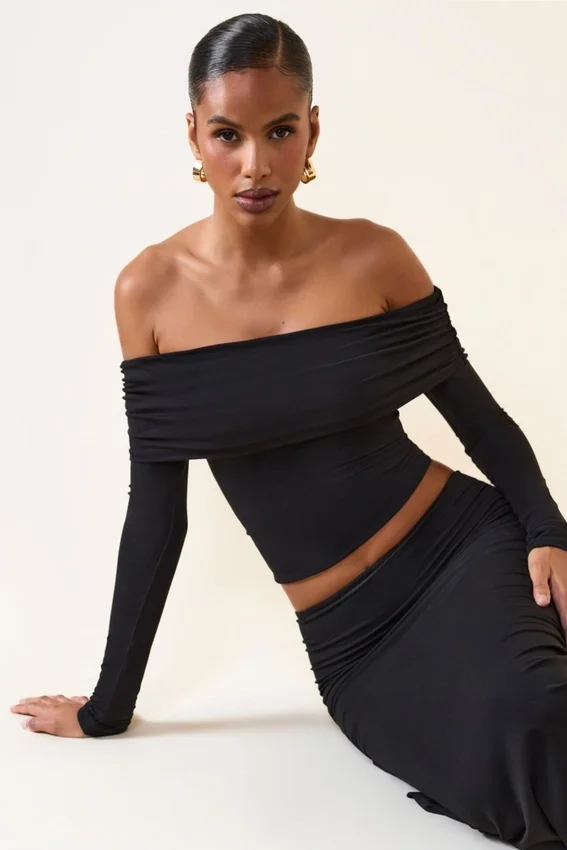 Kesia Modal Off-Shoulder Long-Sleeve Top i svart Kesia Modal Off-Shoulder Long-Sleeve Top i svart