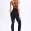 Kiki Modal Plunge Open-Back Flared Jumpsuit i svart Kiki Modal Plunge Open-Back Flared Jumpsuit i svart