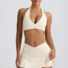 Korsad miniskort i borstad jersey i ivory marl Korsad miniskort i borstad jersey i ivory marl