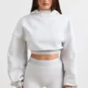 Kort hoodie i stretchig bomullsfleece i gråmelerat Kort hoodie i stretchig bomullsfleece i gråmelerat