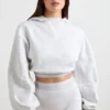 Kort hoodie i stretchig bomullsfleece i gråmelerat Kort hoodie i stretchig bomullsfleece i gråmelerat