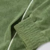 Kort sweatshirt i frotté med dragkedja i grönt Kort sweatshirt i frotté med dragkedja i grönt