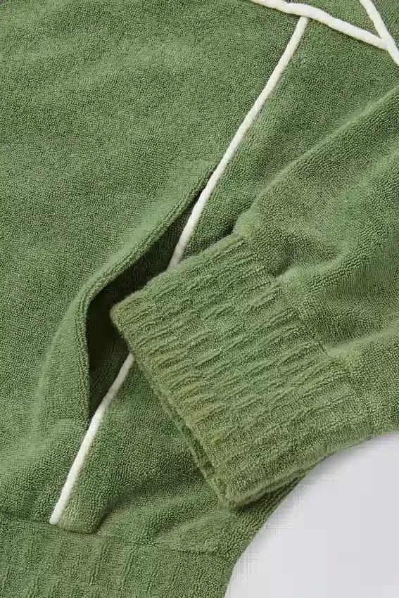 Kort sweatshirt i frotté med dragkedja i grönt Kort sweatshirt i frotté med dragkedja i grönt
