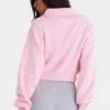Kort sweatshirt i ribbad stickning med dragkedja i ljusrosa Kort sweatshirt i ribbad stickning med dragkedja i ljusrosa