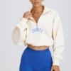 Kort sweatshirt med kvartslås i vitt Kort sweatshirt med kvartslås i vitt