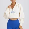 Kort sweatshirt med kvartslås i vitt Kort sweatshirt med kvartslås i vitt