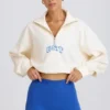 Kort sweatshirt med kvartslås i vitt Kort sweatshirt med kvartslås i vitt
