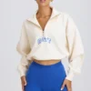 Kort sweatshirt med kvartslås i vitt Kort sweatshirt med kvartslås i vitt