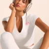 Kort T-shirt i stretchig bomullsjersey med grafiskt tryck i vitt Kort T-shirt i stretchig bomullsjersey med grafiskt tryck i vitt