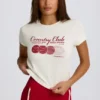 Kort T-shirt med tryck i elfenben Kort T-shirt med tryck i elfenben