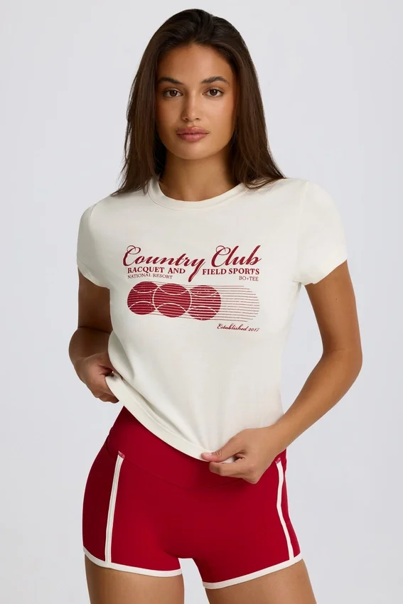 Kort T-shirt med tryck i elfenben Kort T-shirt med tryck i elfenben