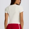 Kort T-shirt med tryck i elfenben Kort T-shirt med tryck i elfenben