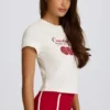 Kort T-shirt med tryck i elfenben Kort T-shirt med tryck i elfenben