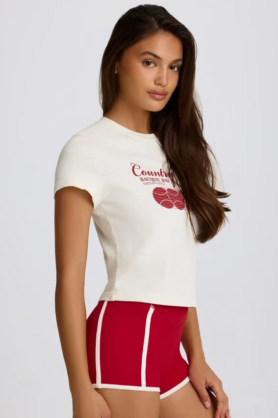 Kort T-shirt med tryck i elfenben Kort T-shirt med tryck i elfenben