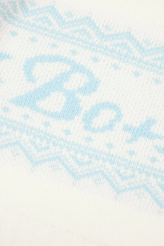 Kort tröja i jacquardstickning i ivory Kort tröja i jacquardstickning i ivory