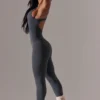 Lång jumpsuit med utskärningar i grått Lång jumpsuit med utskärningar i grått